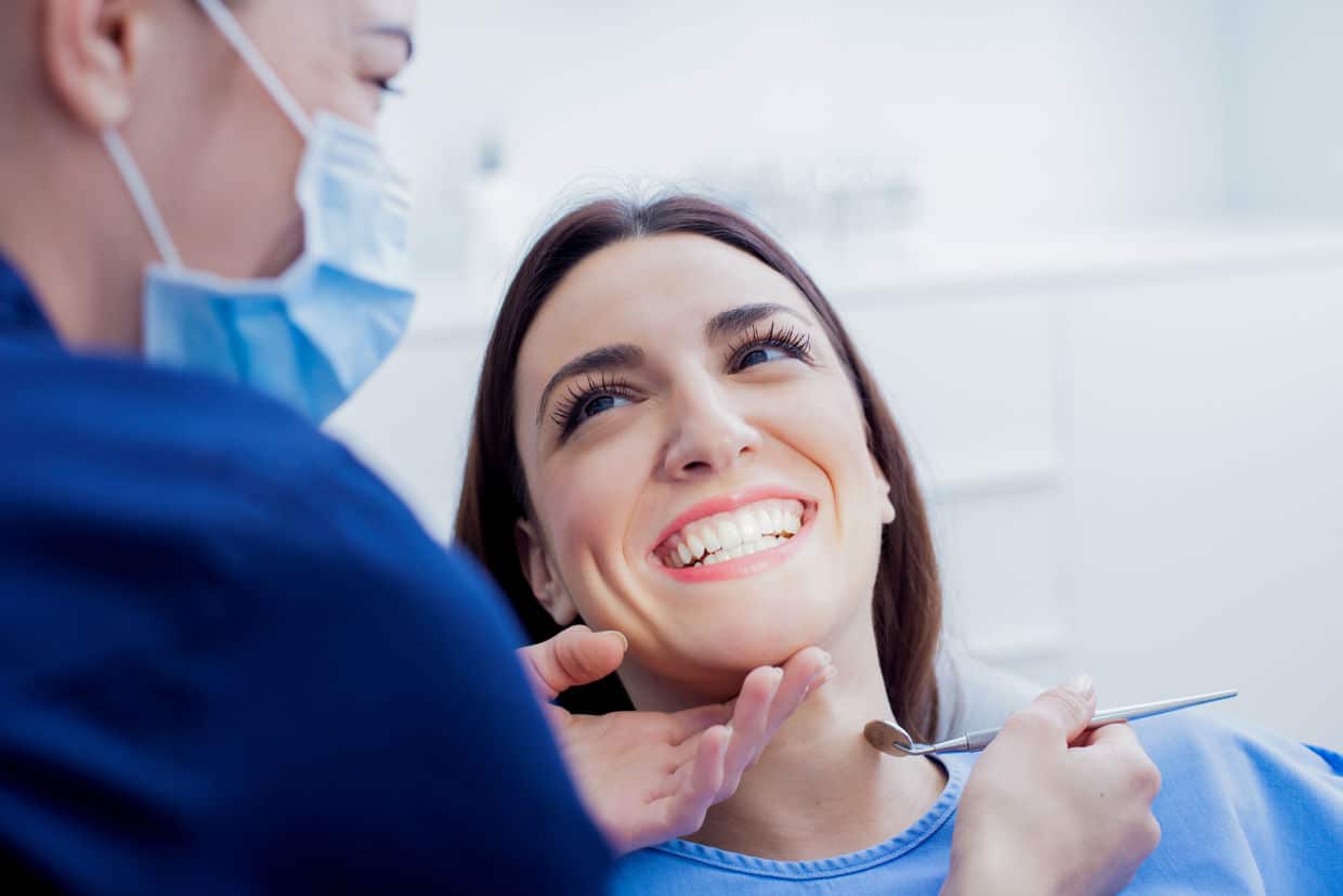 happy patient at the best dentist for dental implants